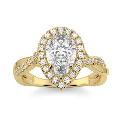 Gold ring with a pear-shaped diamond and smaller diamonds on a white background yb jewellers twist halo pear shape engagement diamond ring best selling design ring and trending design 2026