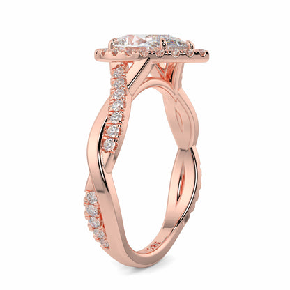 Rose gold ring with diamond accents on a white background yb jewellers twist halo pear shape engagement diamond ring best selling design ring and trending design 2026