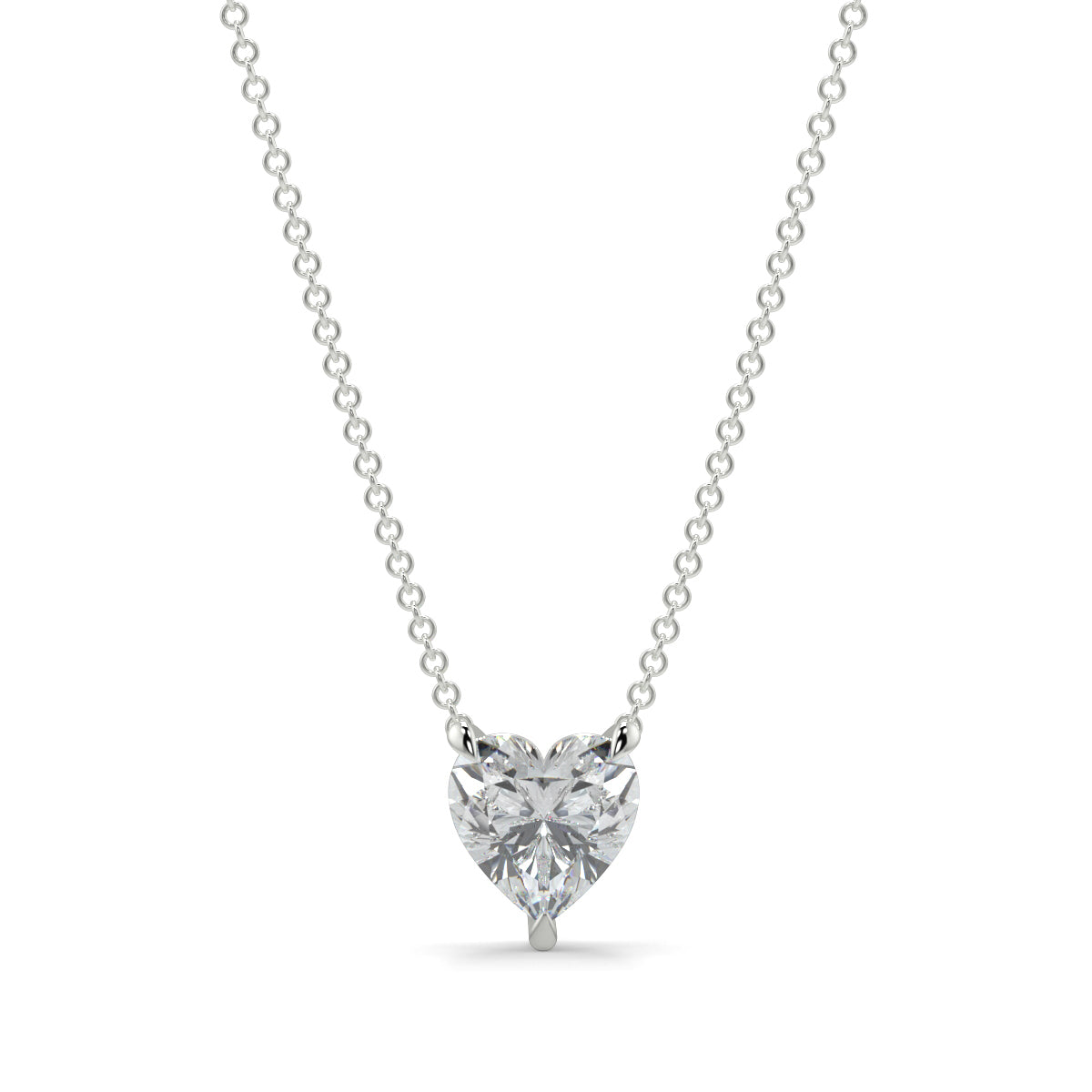 Heart-shaped diamond pendant on a chain against a white background 