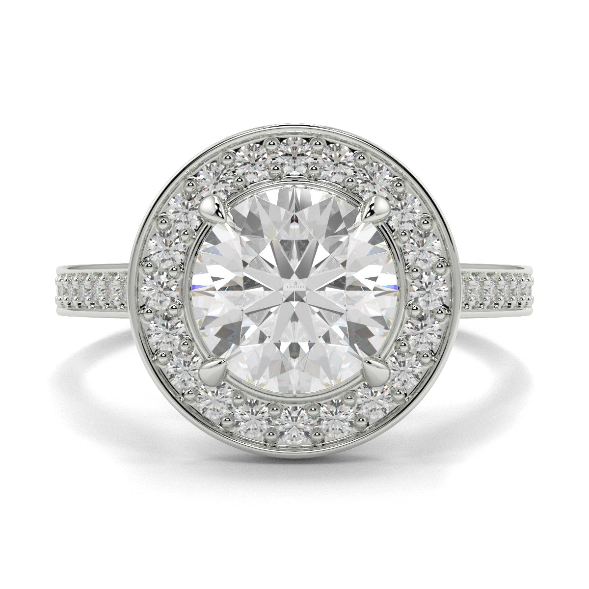 Diamond ring with a halo of smaller diamonds on a white background engagement ring Yb jewellers 