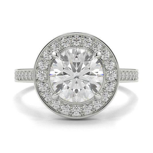 Diamond ring with a halo of smaller diamonds on a white background engagement ring Yb jewellers 