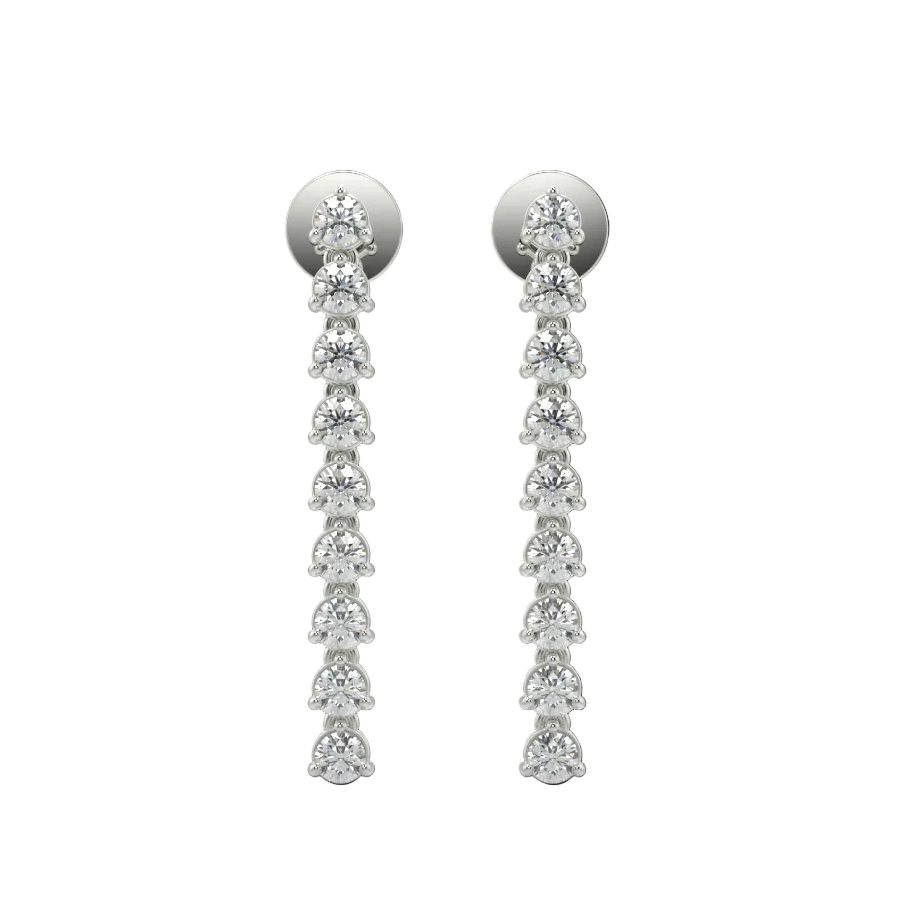 Pair of diamond earrings on a white background
