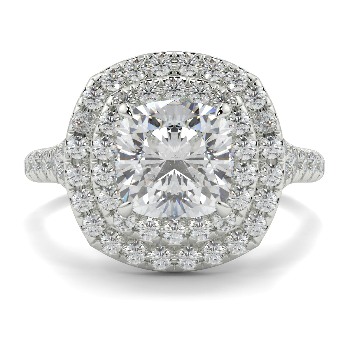 Diamond ring with a central gemstone and halo of smaller diamonds on a white background Yb jewellers trending design double halo ring