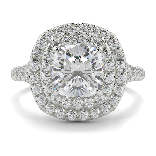 Diamond ring with a central gemstone and halo of smaller diamonds on a white background Yb jewellers trending design double halo ring