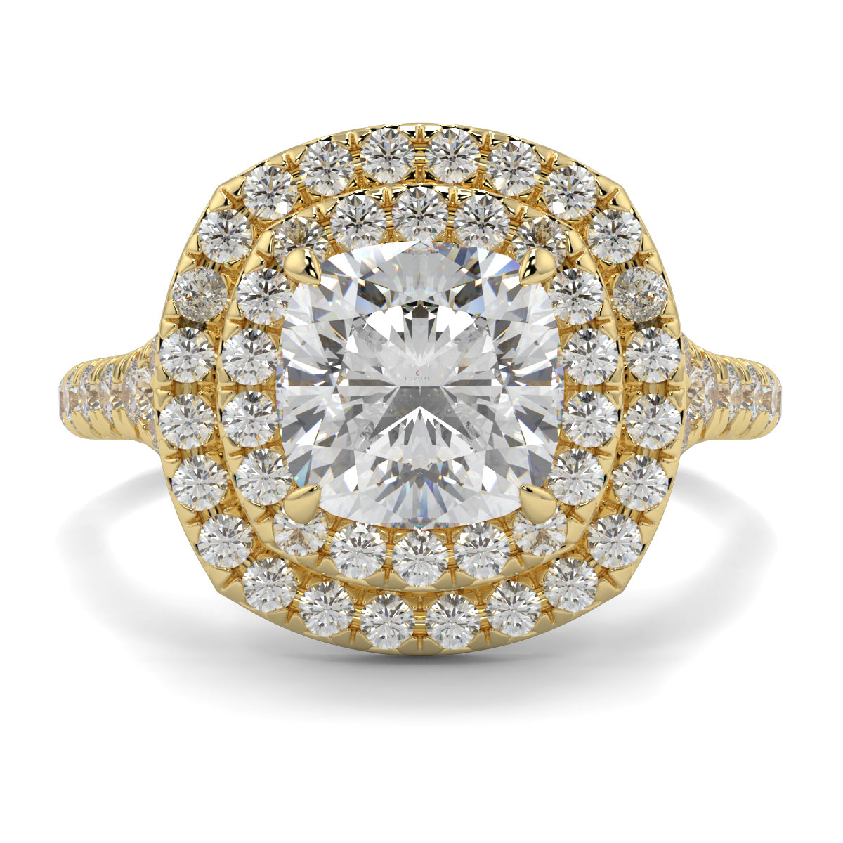 Gold ring with a large central diamond and smaller diamonds around on a white background Yb jewellers trending design double halo ring