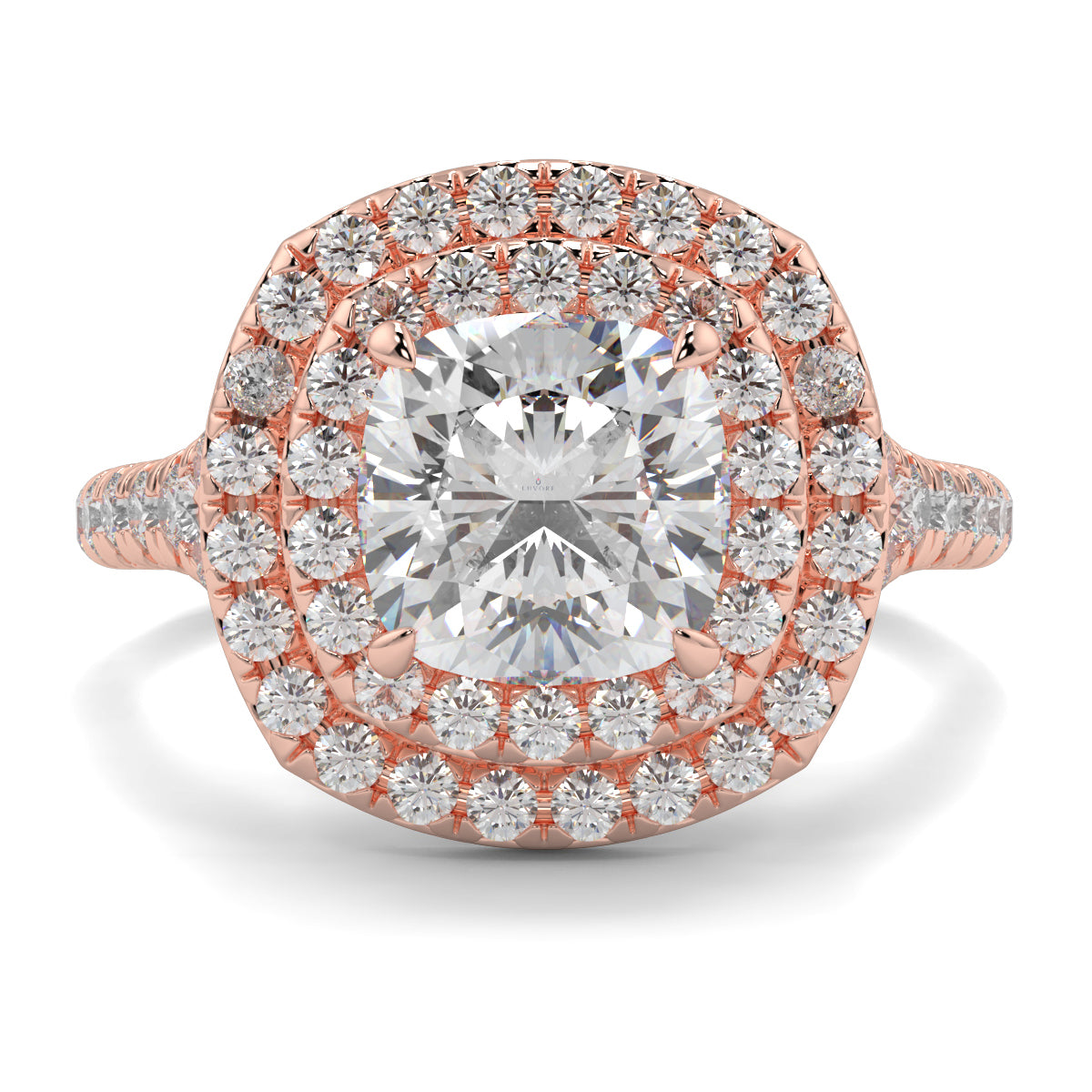 Rose gold ring with a large diamond and smaller diamonds around on a white background Yb jewellers trending design double halo ring