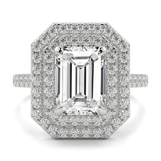 Diamond ring with emerald-cut center stone and halo on a white background yb jewellers best selling ring designs emerald diamond double halo