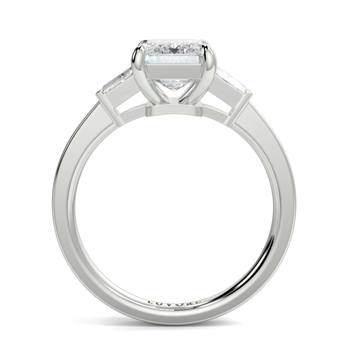 Diamond ring with 'Loyale' engraving on a white background yb_jewellers_3_stone_trilogy_engagement_ring_round_and_pear_shape_best_selling_design_trending_diamond_ring