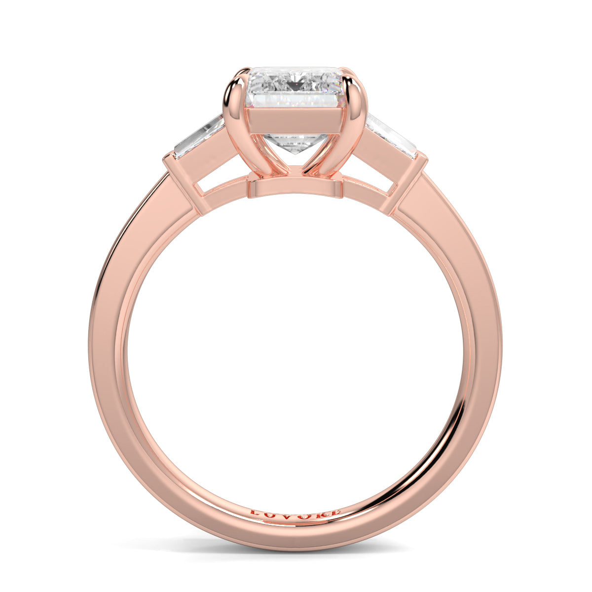 Rose gold ring with a diamond on a white background yb_jewellers_3_stone_trilogy_engagement_ring_round_and_pear_shape_best_selling_design_trending_diamond_ring