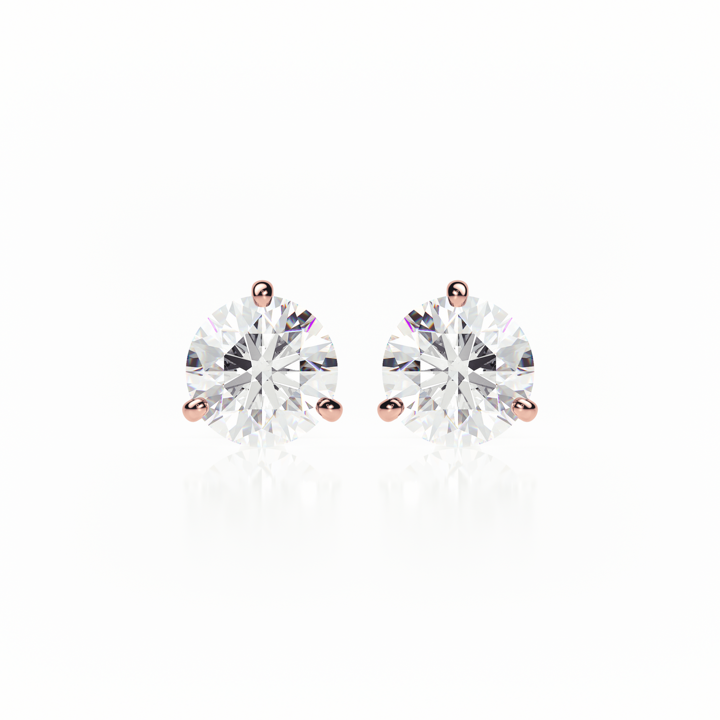 Pair of diamond stud earrings on a white background yb jewellers popular diamond earrings gifts
