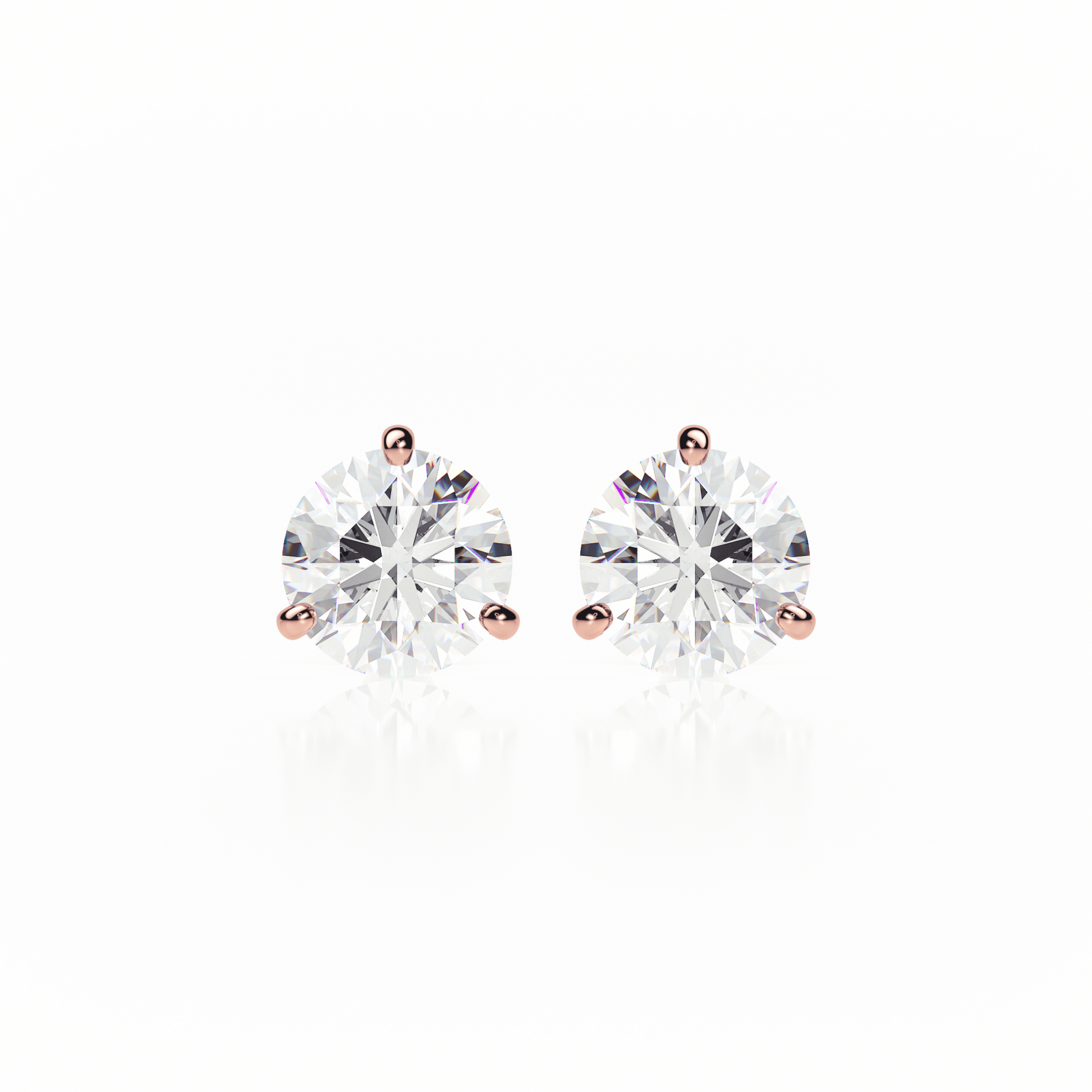 Pair of diamond stud earrings on a white background yb jewellers popular diamond earrings gifts