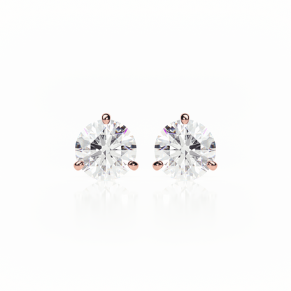 Pair of diamond stud earrings on a white background yb jewellers popular diamond earrings gifts