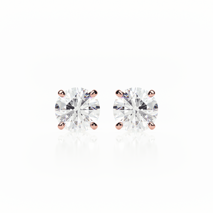 Pair of diamond stud earrings on a white background yb jewellers popular 4 claw diamond stud earrings for gifts