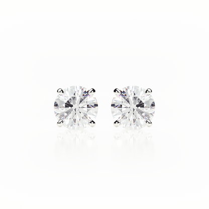 Pair of diamond stud earrings on a white background yb jewellers popular 4 claw diamond stud earrings for gifts