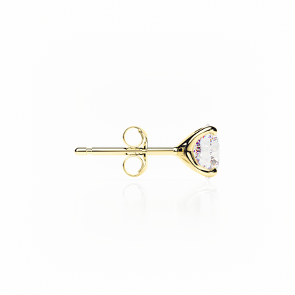 Gold earring with a clear gemstone on a white background yb jewellers popular 4 claw diamond stud earrings for gifts