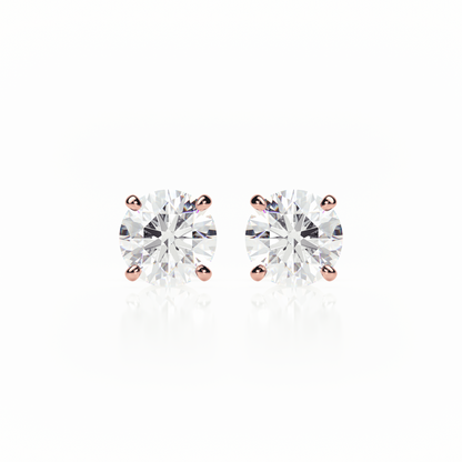 Pair of diamond stud earrings on a white background yb jewellers screw back earrings best selling design 