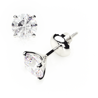 Pair of diamond stud earrings on a white background yb jewellers screw back earrings best selling design 