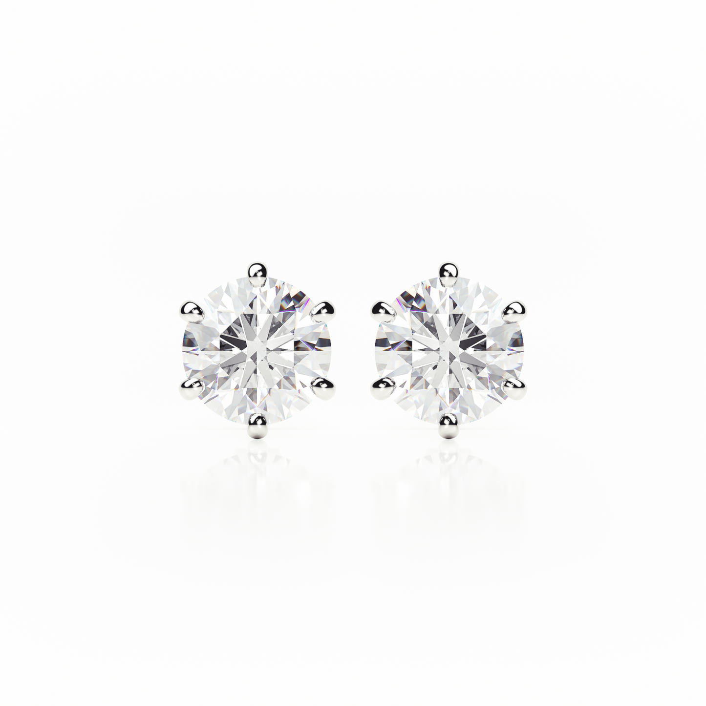 Pair of diamond stud earrings on a white background yb jewellers earrings best sellers
