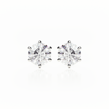 Pair of diamond stud earrings on a white background yb jewellers earrings best sellers