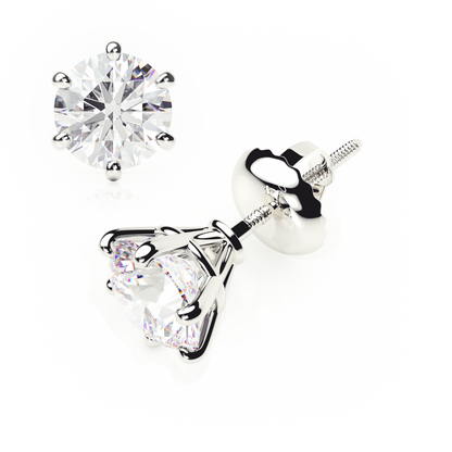 Pair of diamond stud earrings on a white background yb jewellers earrings best sellers