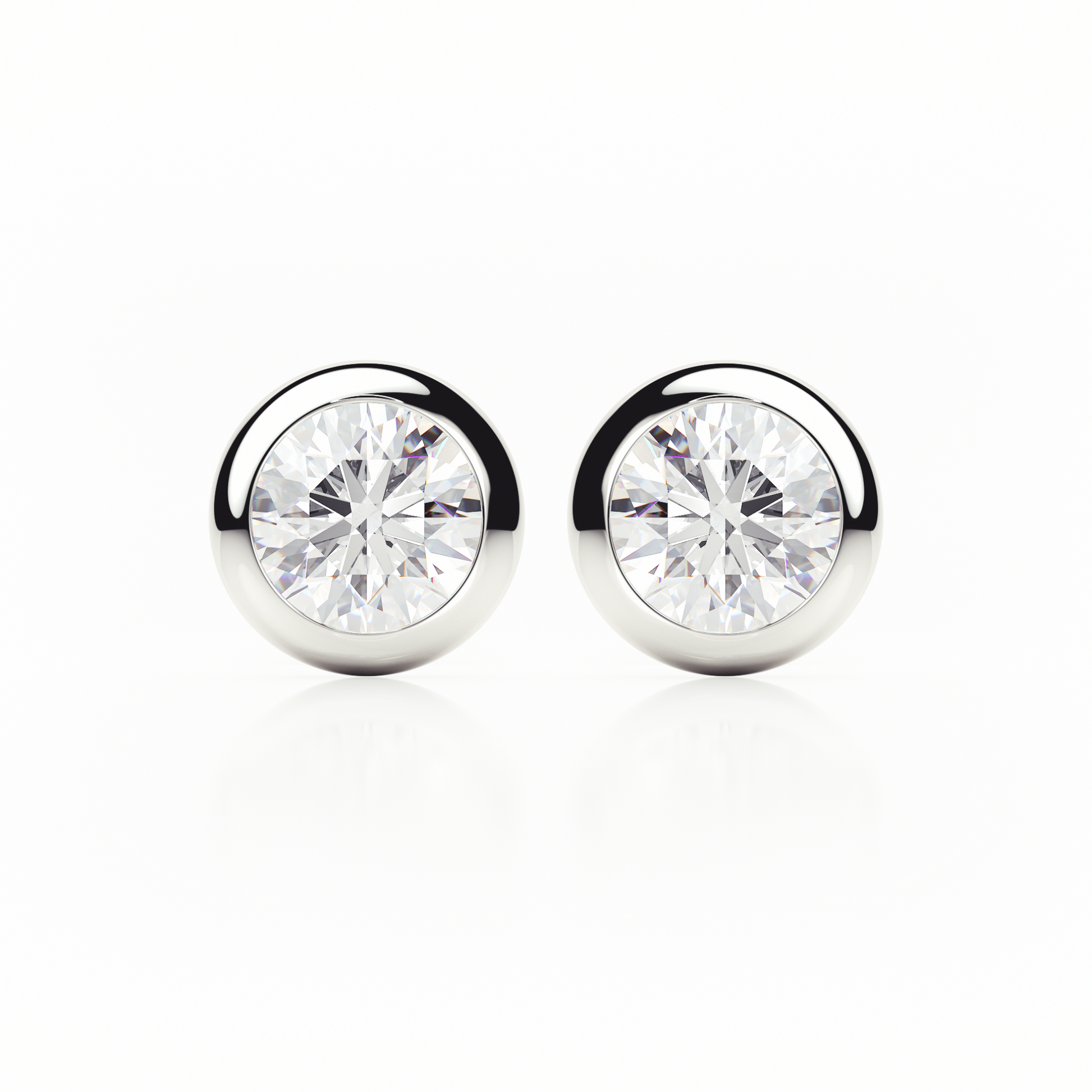 Pair of silver stud earrings with clear gemstones on a white background