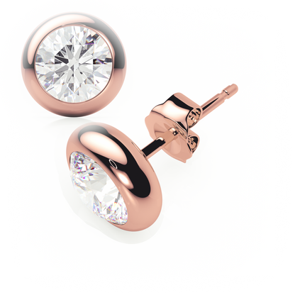 Rose gold earrings with clear gemstones on a white background