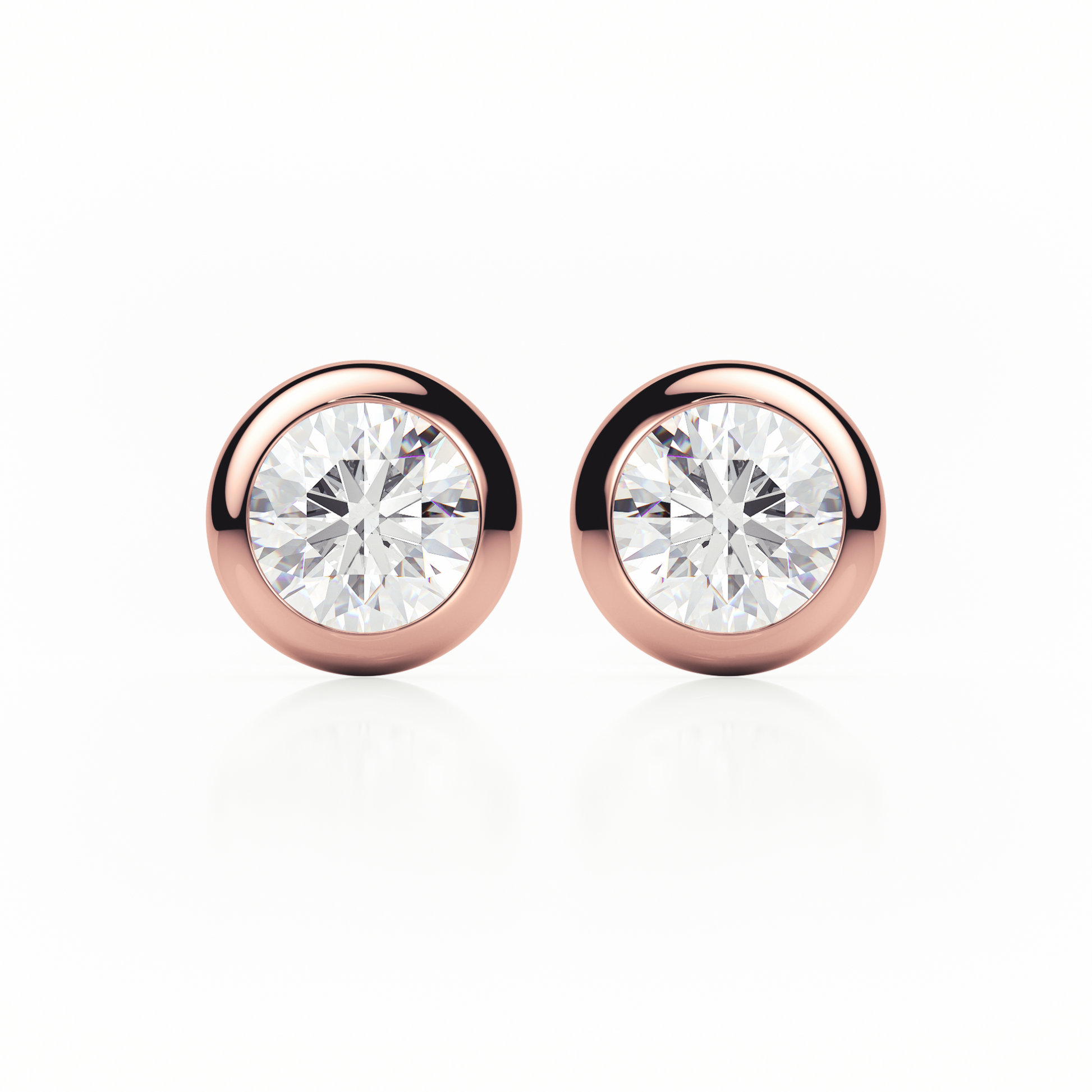 Rose gold earrings with clear gemstones on a white background