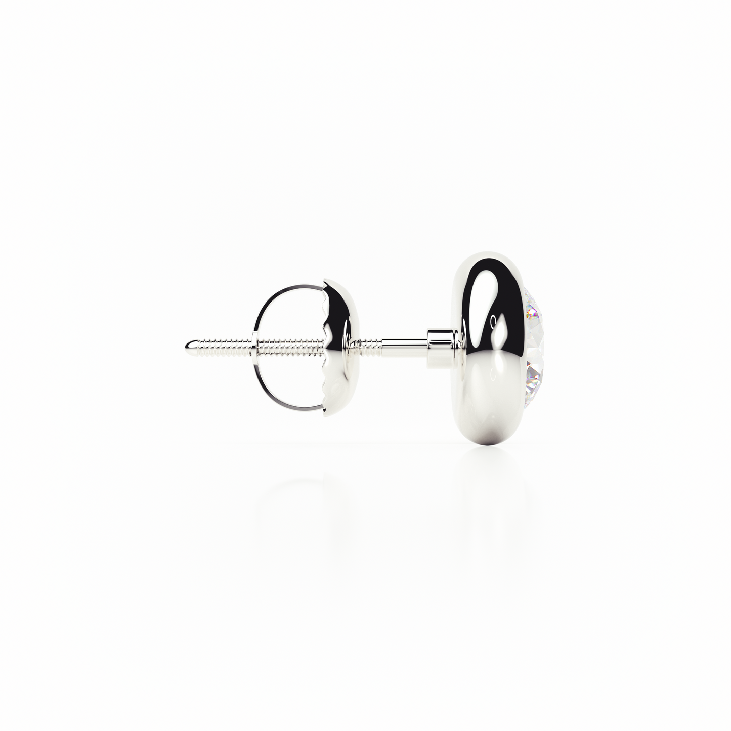 Silver earring on a white background