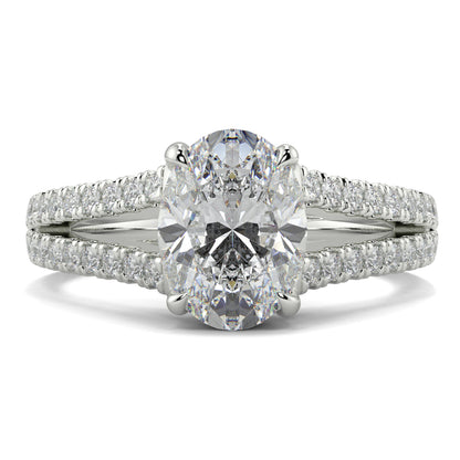 Diamond ring with a large central gemstone and smaller stones on a white background Yb jewellers engagement ring straight band