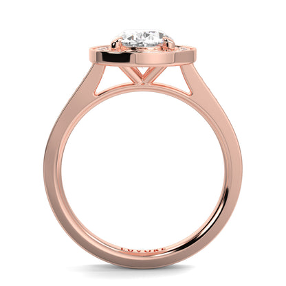 Rose gold ring with a diamond on a white background oval halo best sling design Yb Jewellers 