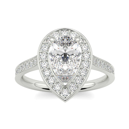 Diamond ring with a pear-shaped center stone on a white background Pear shaped diamond engagement ring Yb jewellers trending ring designs
