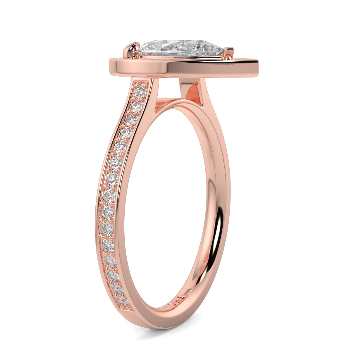 Rose gold ring with a diamond on a white background Pear shaped diamond engagement ring Yb jewellers trending ring designs