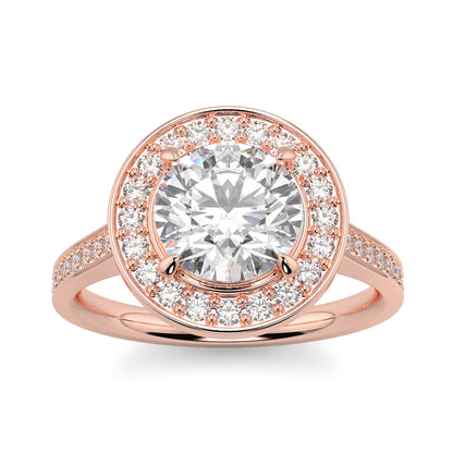 Rose gold ring with a large diamond and smaller diamonds around on a white background engagement ring Yb jewellers trending design