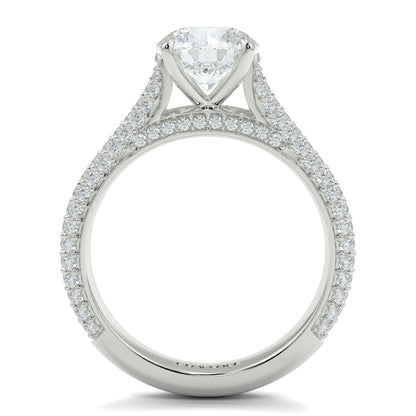 Diamond ring with a clear gemstone on a white background Yb jewellers engagement ring straight band