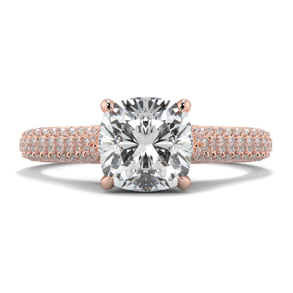 Rose gold ring with a large diamond and smaller diamonds on the band against a white background Yb jewellers engagement ring straight band