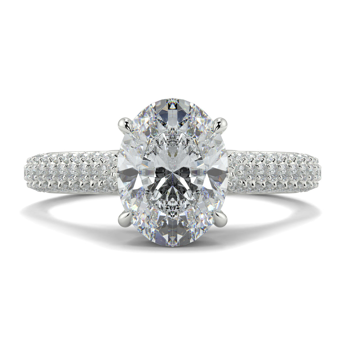 Diamond ring with two large gemstones and a smaller one on a white Yb jewellers engagement ring straight band background