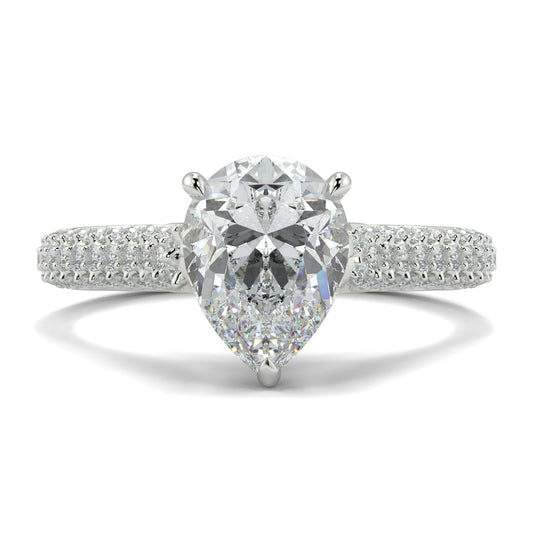 Diamond ring with a pear-shaped center stone on a white background Yb jewellers engagement ring straight band