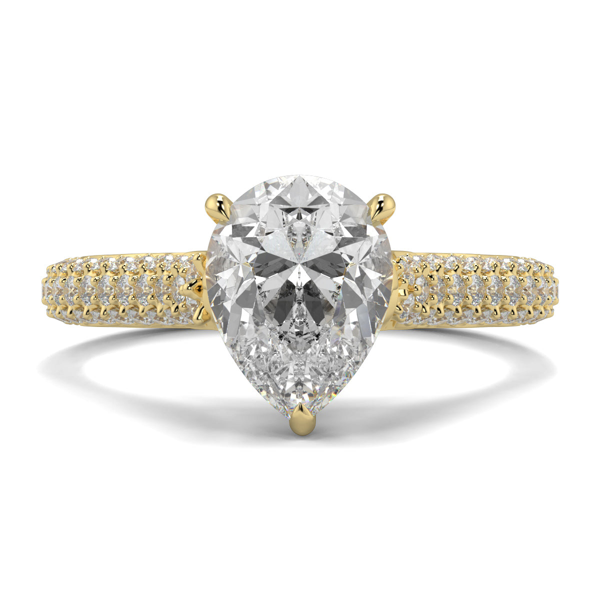 Gold ring with a pear-shaped diamond on a white background Yb jewellers engagement ring straight band