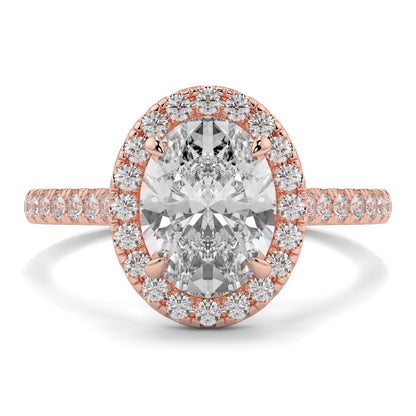 Rose gold ring with a large diamond and smaller diamonds around on a white background yb jewellers oval engagement ring best value