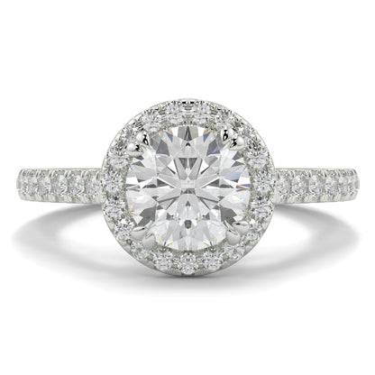 Diamond ring with a clear gemstone on a white background round diamond halo engagement ring yb jewellers tiger claws vintage style