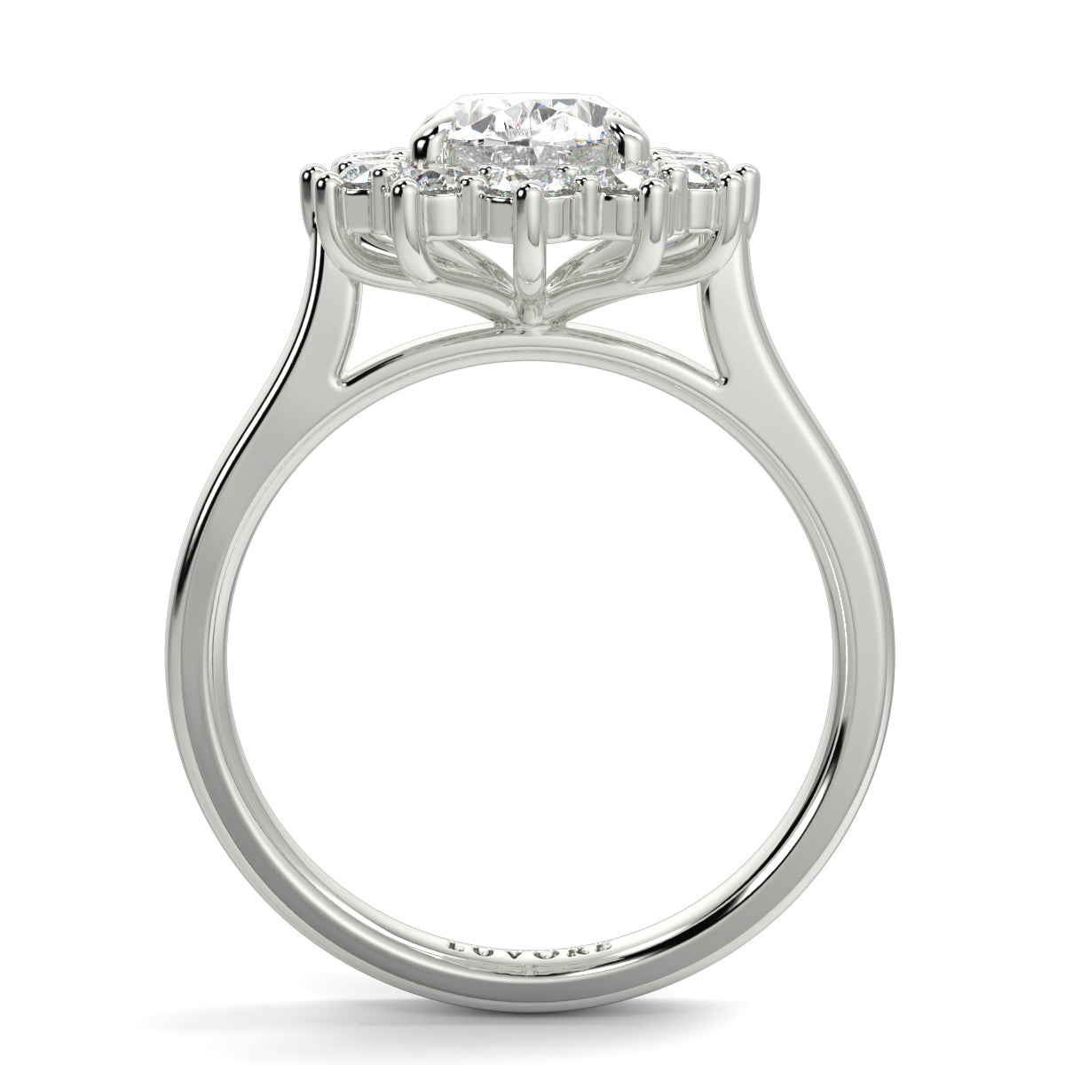 Diamond ring with a halo setting on a white background Yb jewellers engagement ring with a cluster halo and oval diamond trending design 