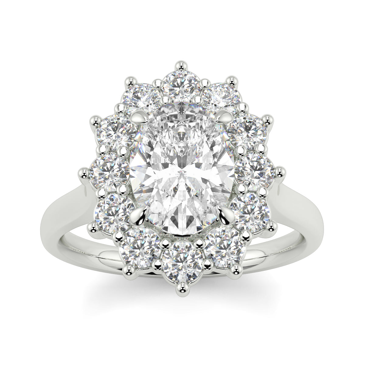 Diamond ring with a halo of smaller diamonds on a white background Yb jewellers engagement ring with a cluster halo and oval diamond trending design 
