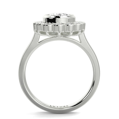 Silver ring with a detailed design on a white background yb jewellers cluster halo ring engagement ring grain set halo oval shape plain band