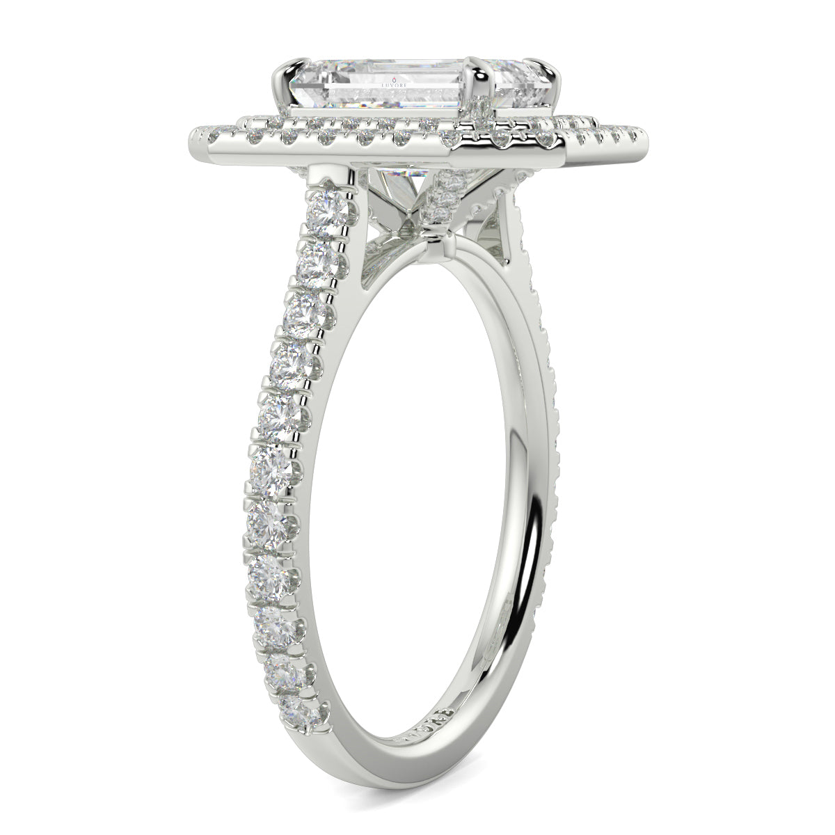 Diamond ring with a rectangular center stone on a white background yb jewellers best selling ring designs emerald diamond double halo