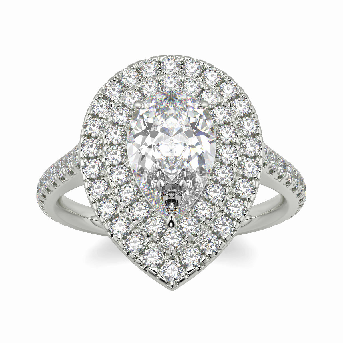 Diamond ring with a pear-shaped center stone on a white background yb jewellers pear double halo ring best seller trending design