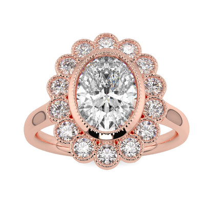 Rose gold ring with a large central diamond and smaller diamonds around on a white background yb jewellers cluster halo ring engagement ring grain set halo oval shape plain band