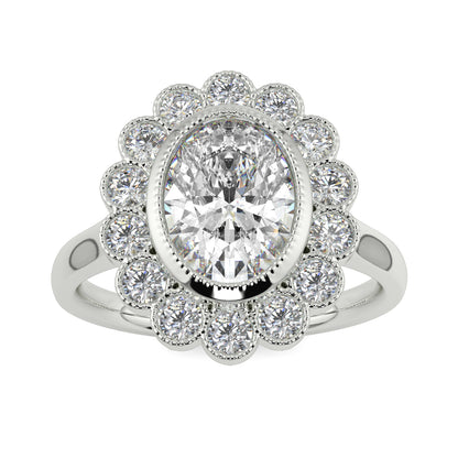 Diamond ring with a floral halo on a white background yb jewellers cluster halo ring engagement ring grain set halo oval shape plain band