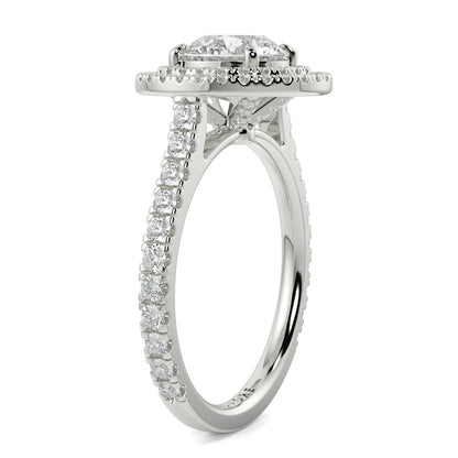 Diamond ring with a halo and pavé setting on a white background yb jewellers round double halo engagement ring best seller trending