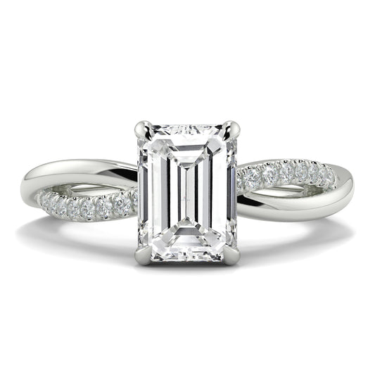 Diamond ring with emerald-cut center stone on a white background Yb jewellers engagement ring twist band