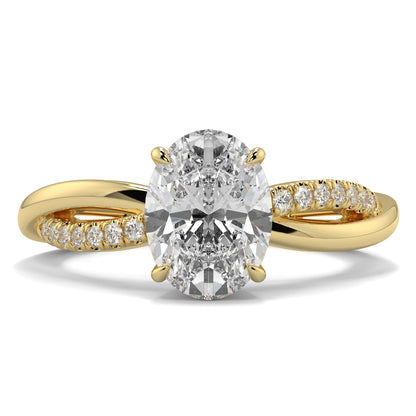 Gold ring with a large diamond and smaller diamonds on the band against a white background Yb jewellers engagement ring twist band
